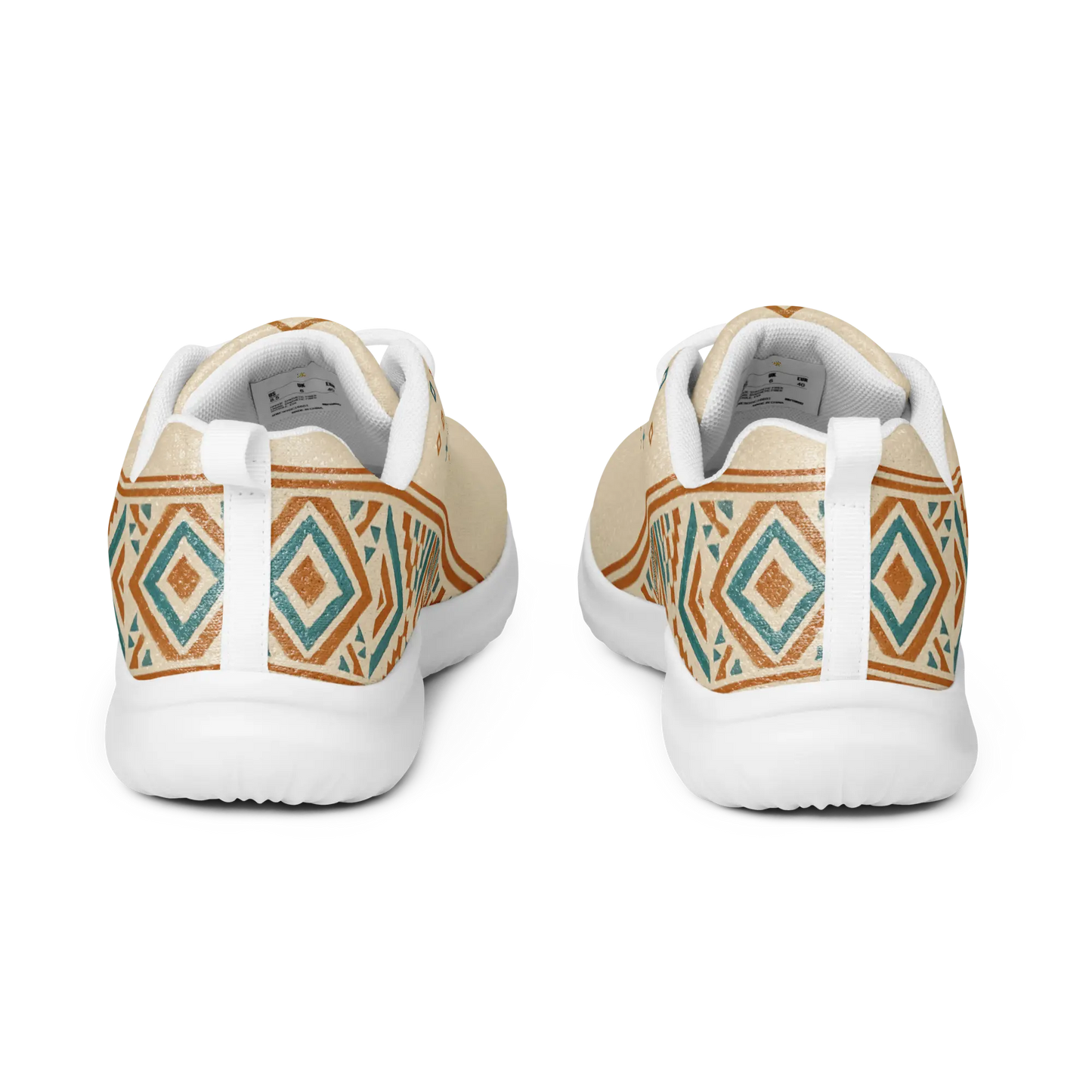 Beige men's athletic sneakers with Berber tribal pattern in teal and rust tones, shown on patterned rug with dog nearby.