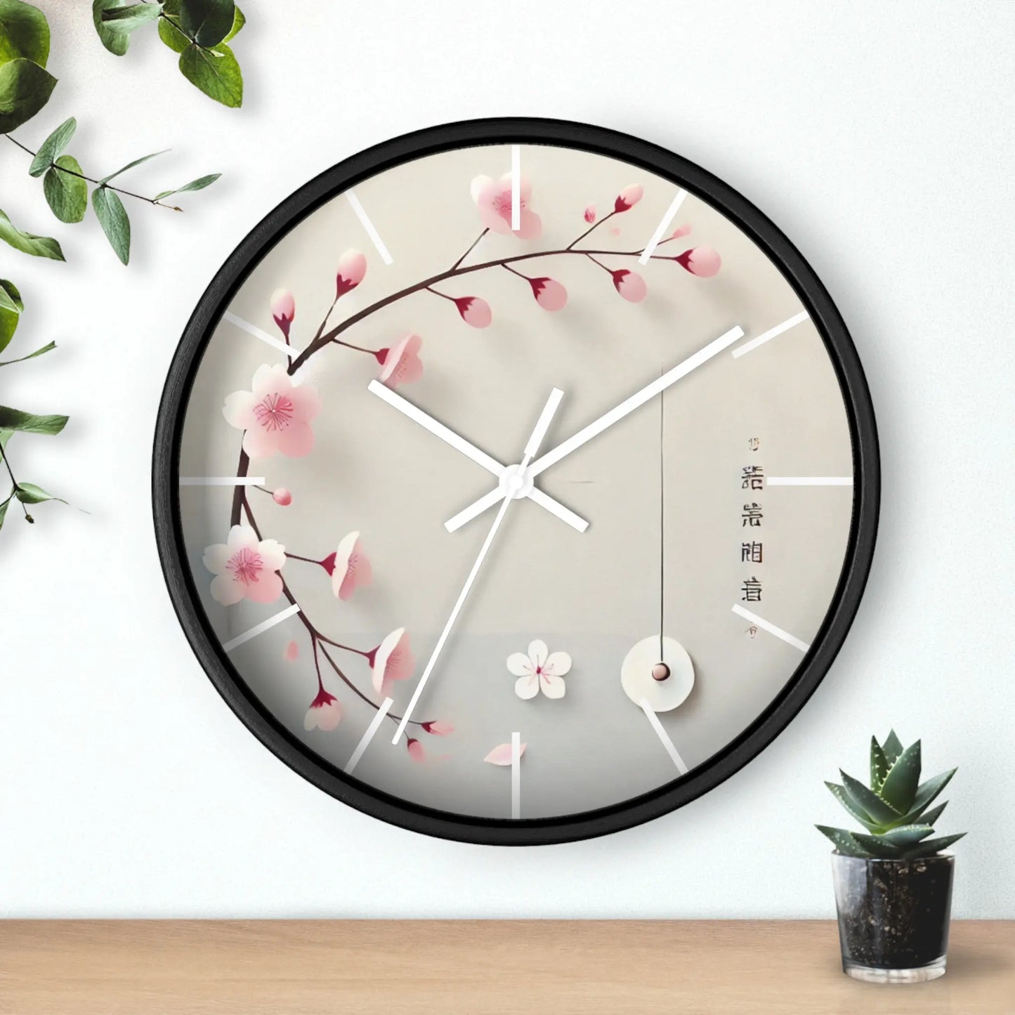 Japanese wall clock with minimalist cherry blossom design, featuring pink sakura flowers on a soft white background in a circular layout