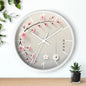 Japanese wall clock with minimalist cherry blossom design, featuring pink sakura flowers on a soft white background in a circular layout