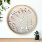 Japanese wall clock with minimalist cherry blossom design, featuring pink sakura flowers on a soft white background in a circular layout