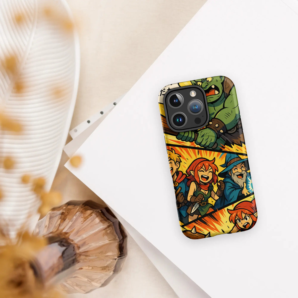 Manga-style iPhone case with fantasy characters and orc battle scene, compatible with iPhone 14 to 16, shown in vibrant comic design.
