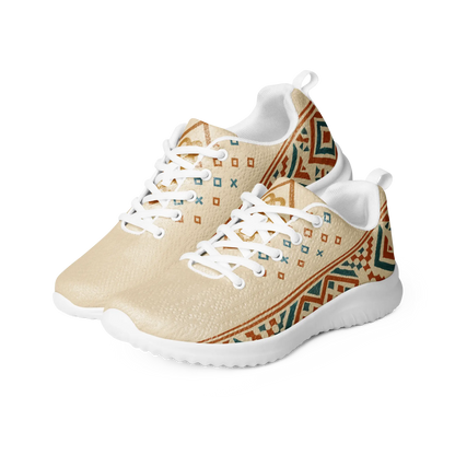 Beige men's athletic sneakers with Berber tribal pattern in teal and rust tones, shown on patterned rug with dog nearby.